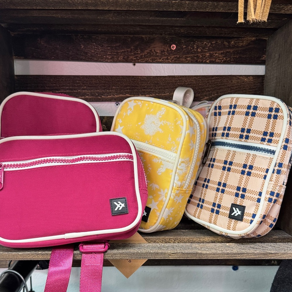 Stylish Backpack Trio in Pink, Yellow, and Plaid